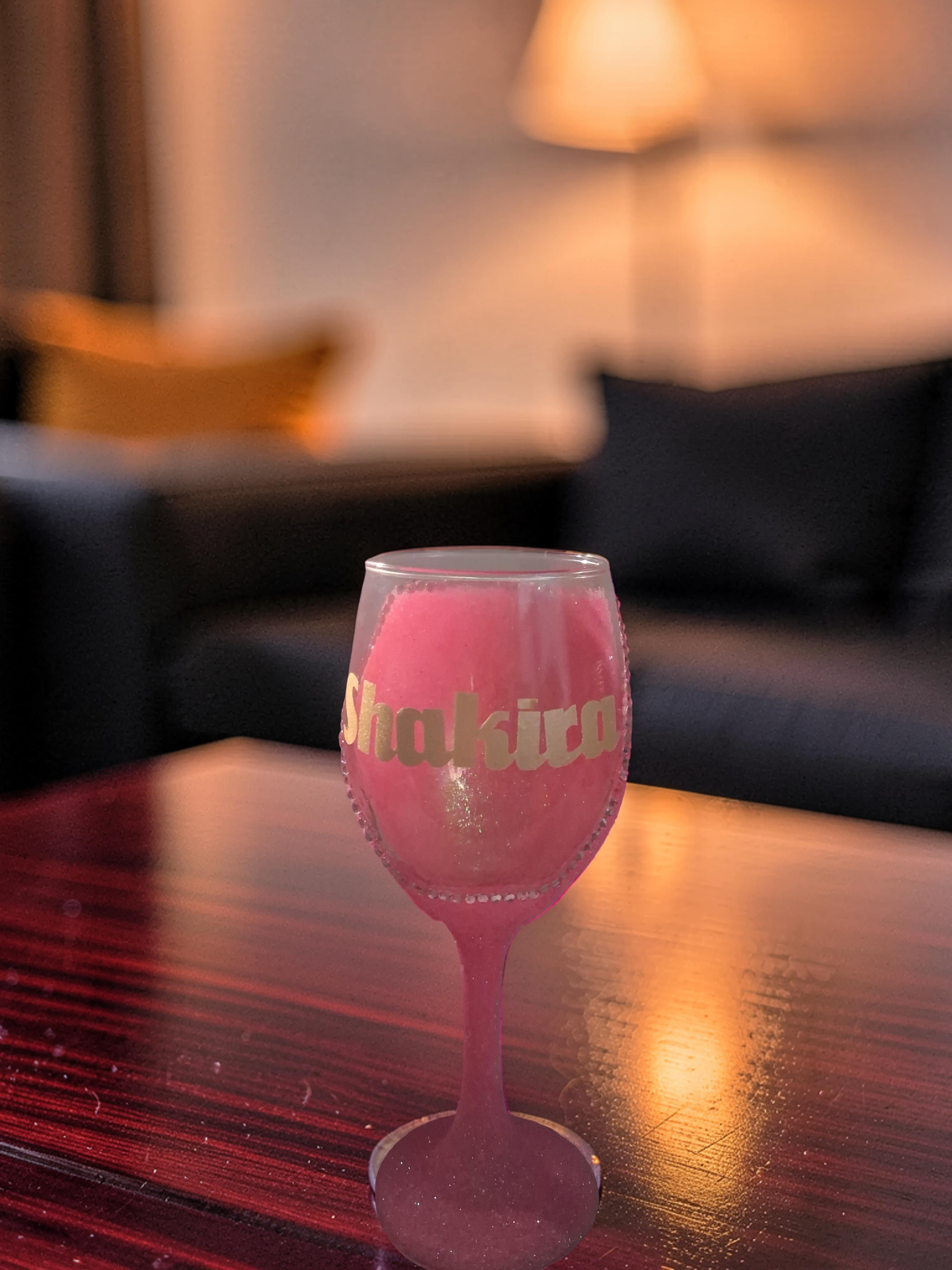 Blush Luxe personalized pink glitter wine glass with Shakira name in gold lettering
