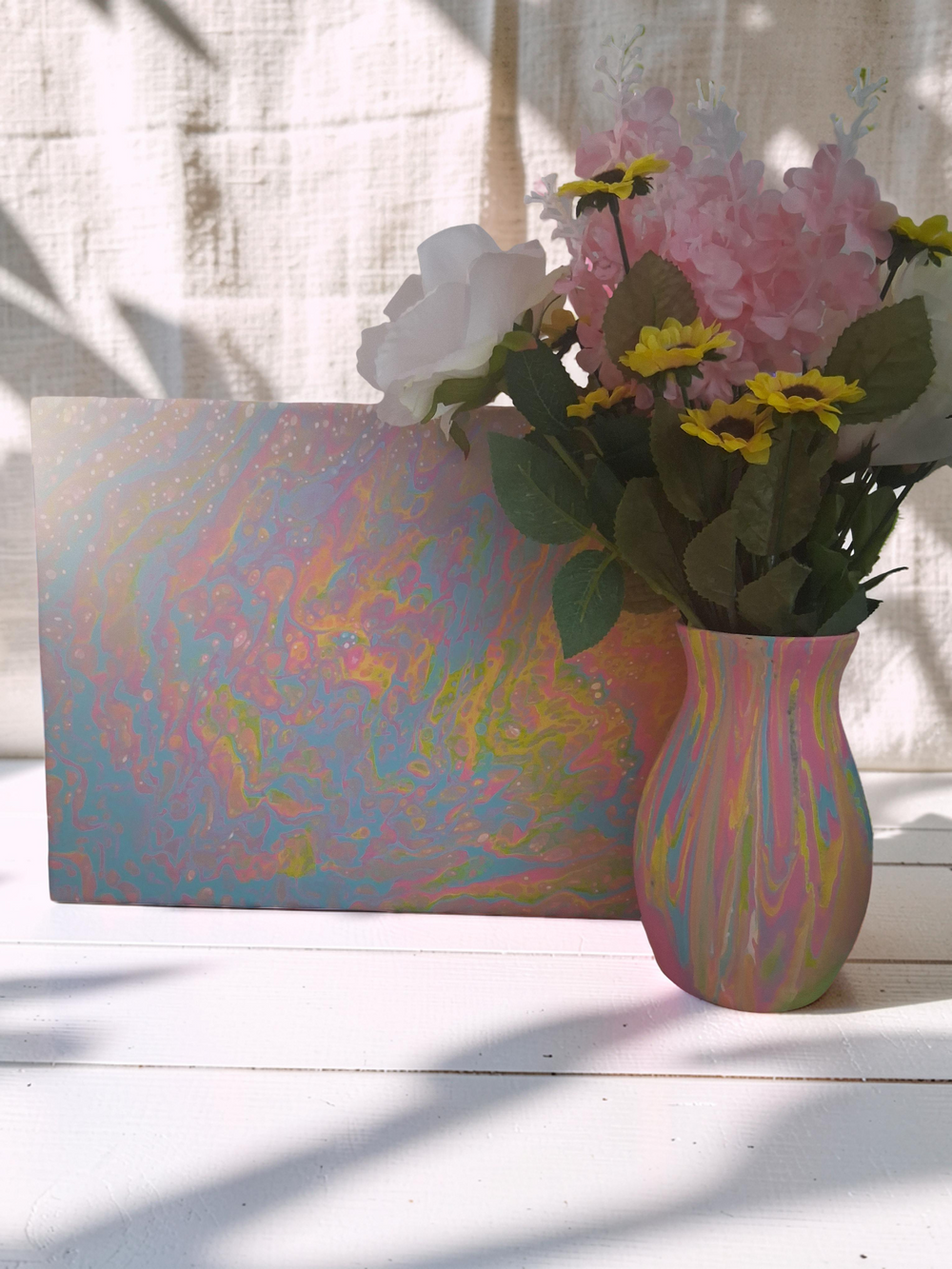 Pastel Sunrise canvas and swirl vase set close up