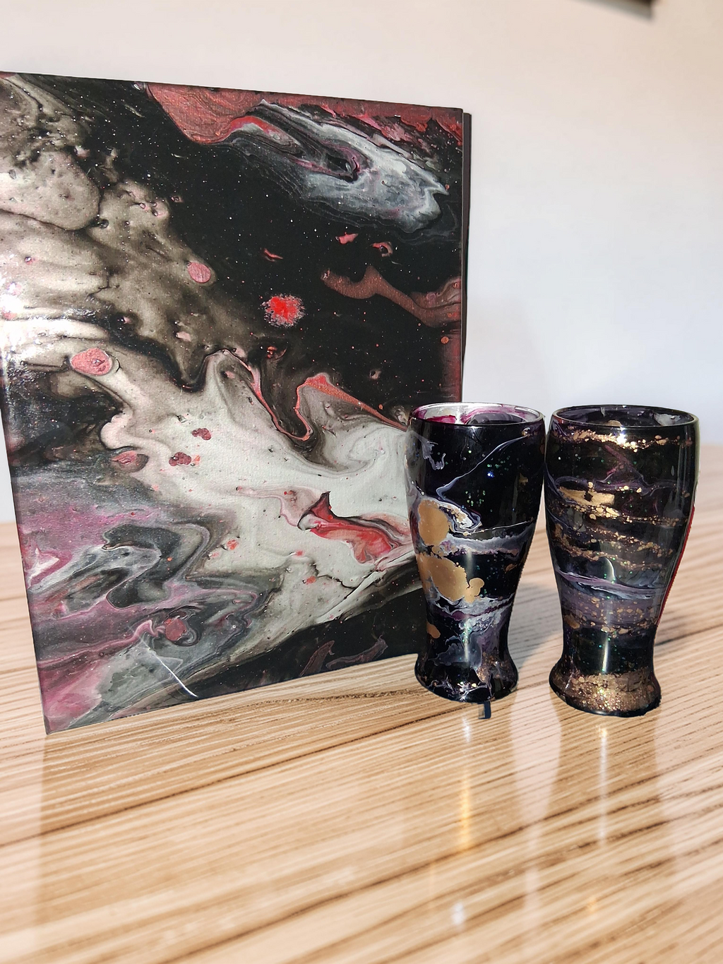 The Golden Treasure handcrafted black and gold fluid pour canvas with matching luxury vases by Kingdom Scented Co
