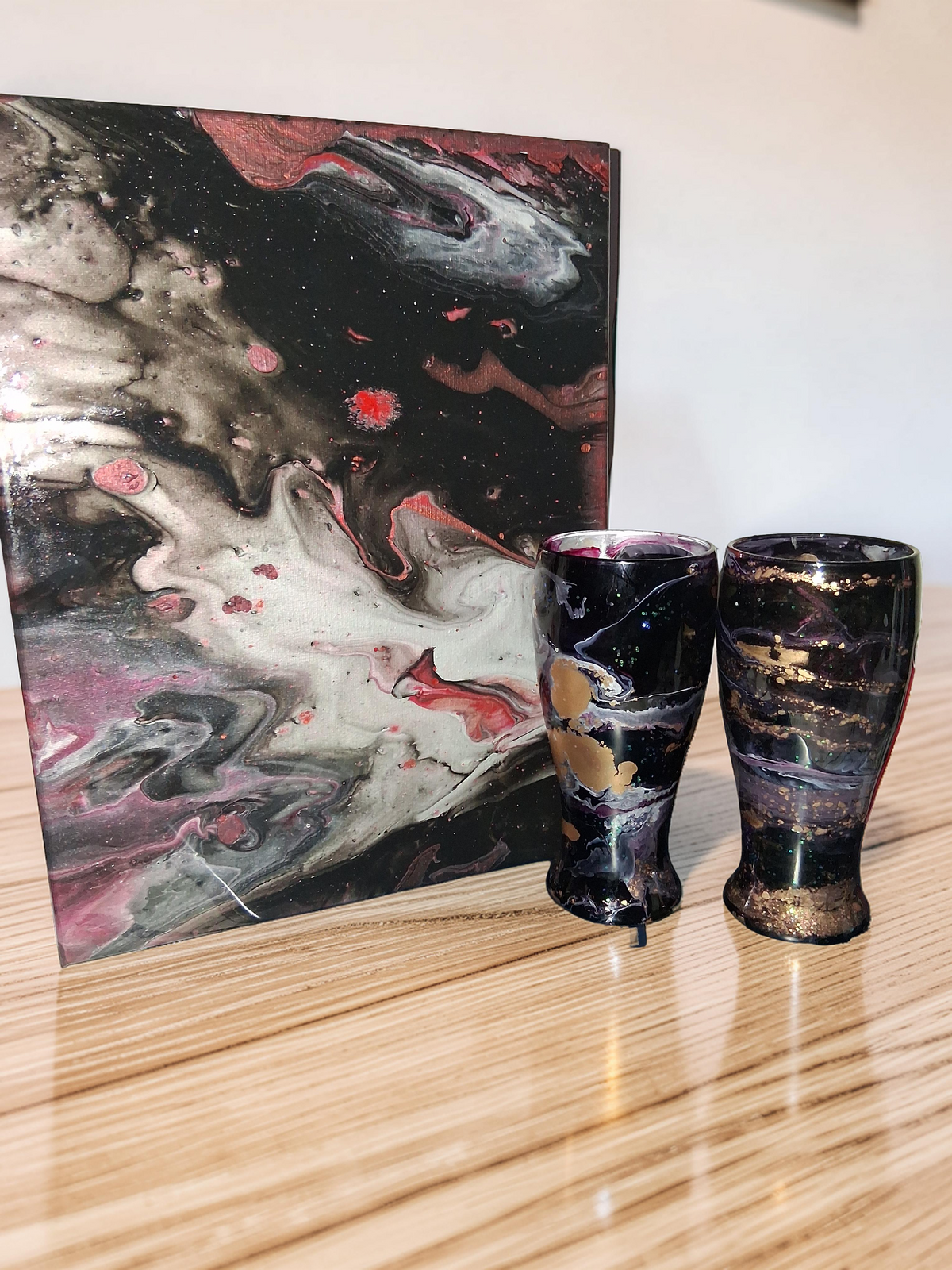 The Golden Treasure handcrafted black and gold fluid pour canvas with matching luxury vases by Kingdom Scented Co