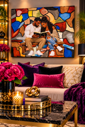 Faith Couple canvas with colorful stone-inspired background in a digitally staged purple and gold living room, not to scale