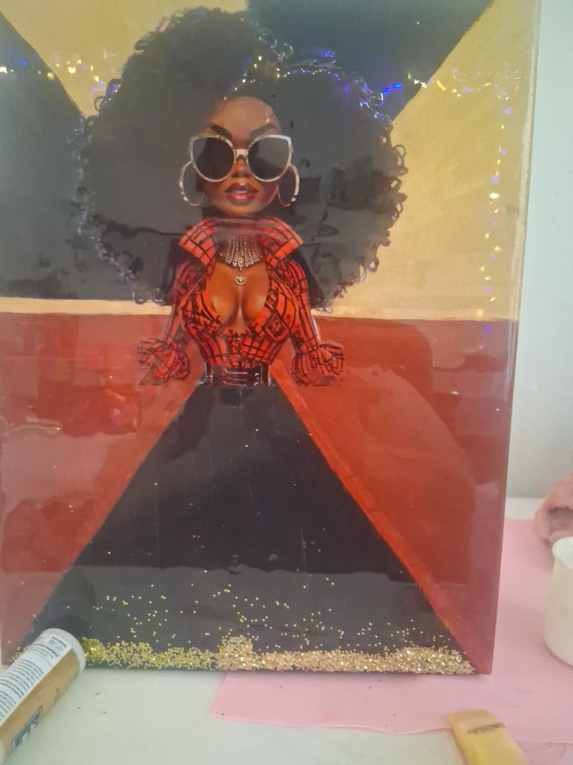 Bold & Beautiful 12x16 handcrafted wall art featuring a confident woman with oversized curls, sunglasses, and a red-and-black look with gold accents